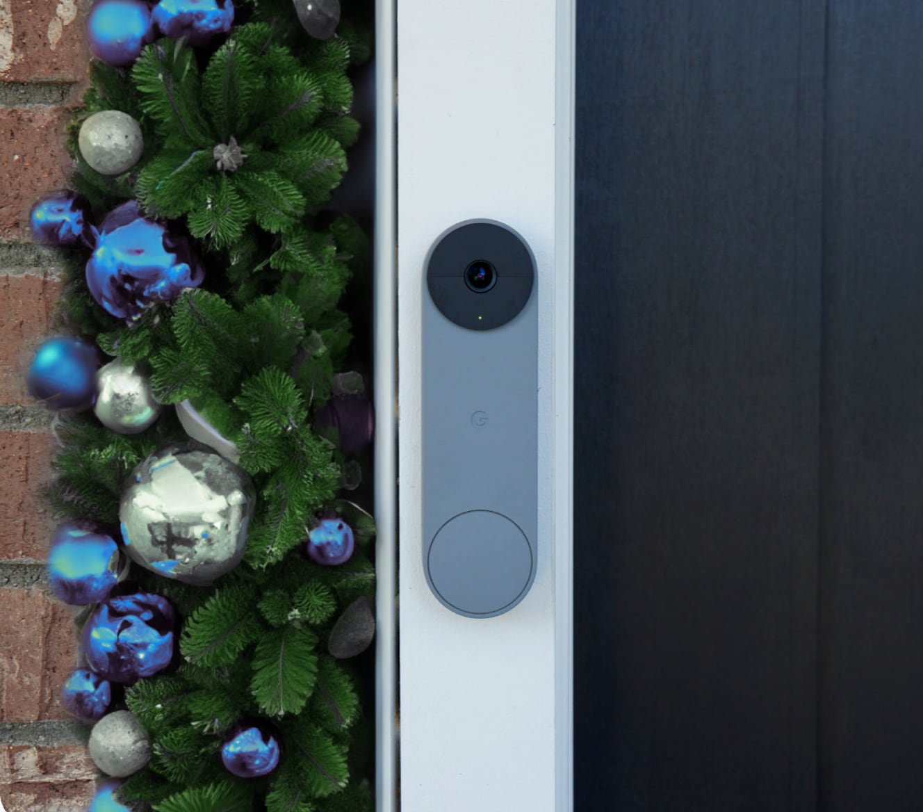 Google Nest Doorbell on a house with holiday decorations