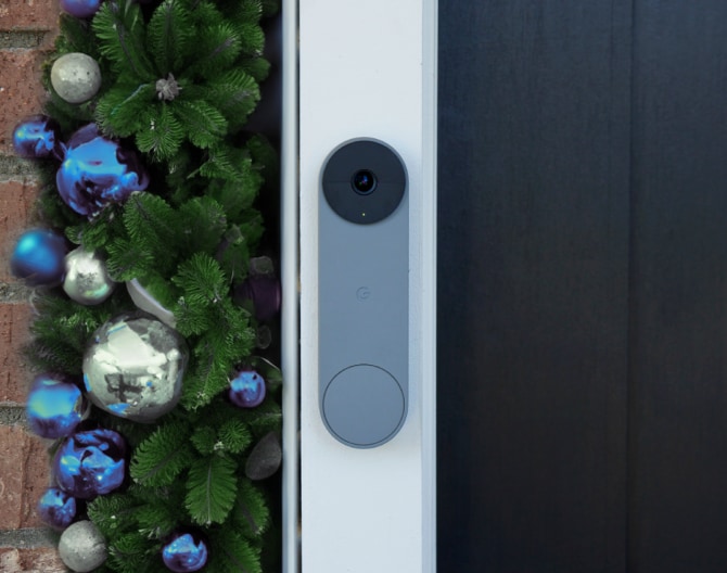 Google Nest Doorbell on a house with holiday decorations