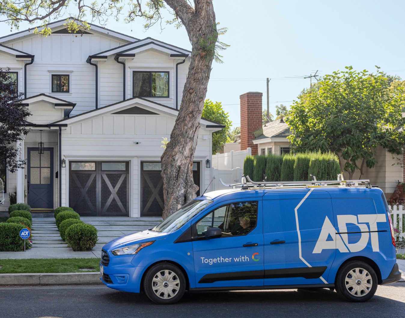 ADT van outside of someone's house