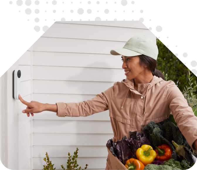 Delivery food woman ringing the Google Nest Doorbell