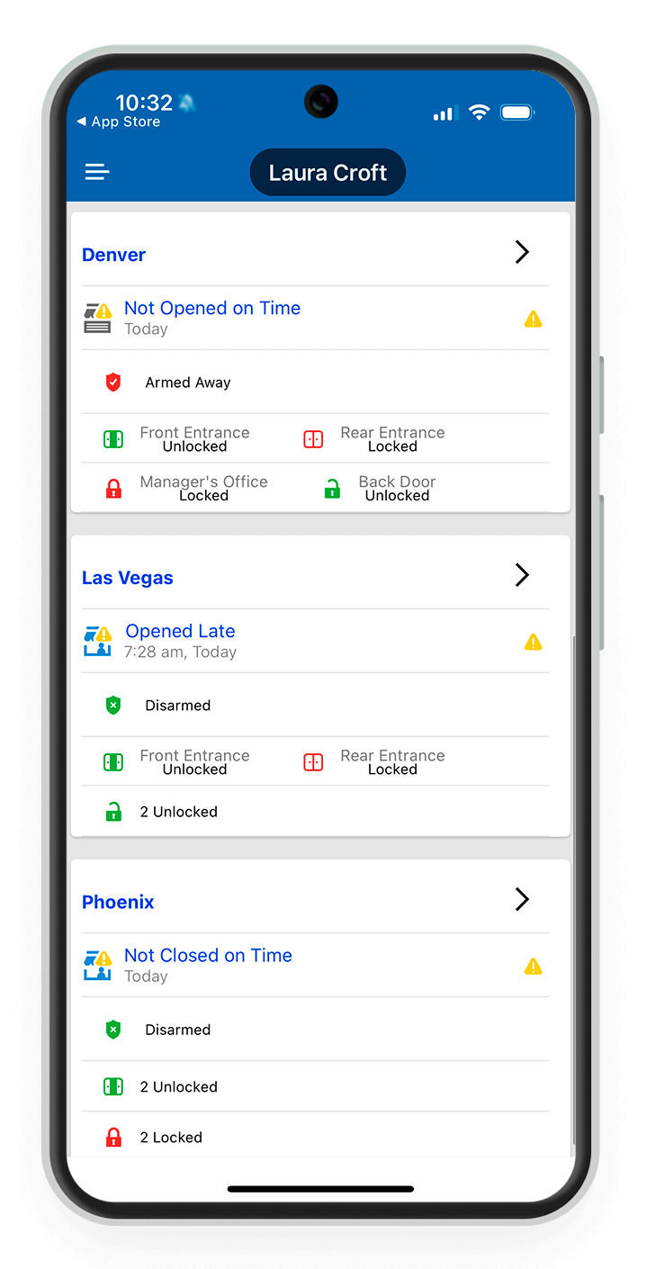 A ceiling-mounted ADT turret camera inside a commercial space, monitoring the area for safety and security. ADT installer and customer in her home