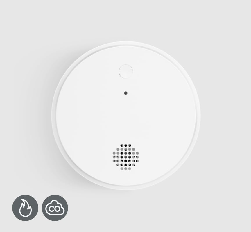 Smoke & Carbon Monoxide Detector on a grey background