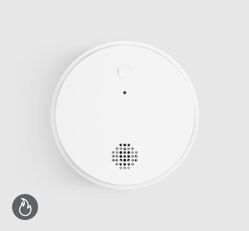 ADT Smoke Detector on a grey background