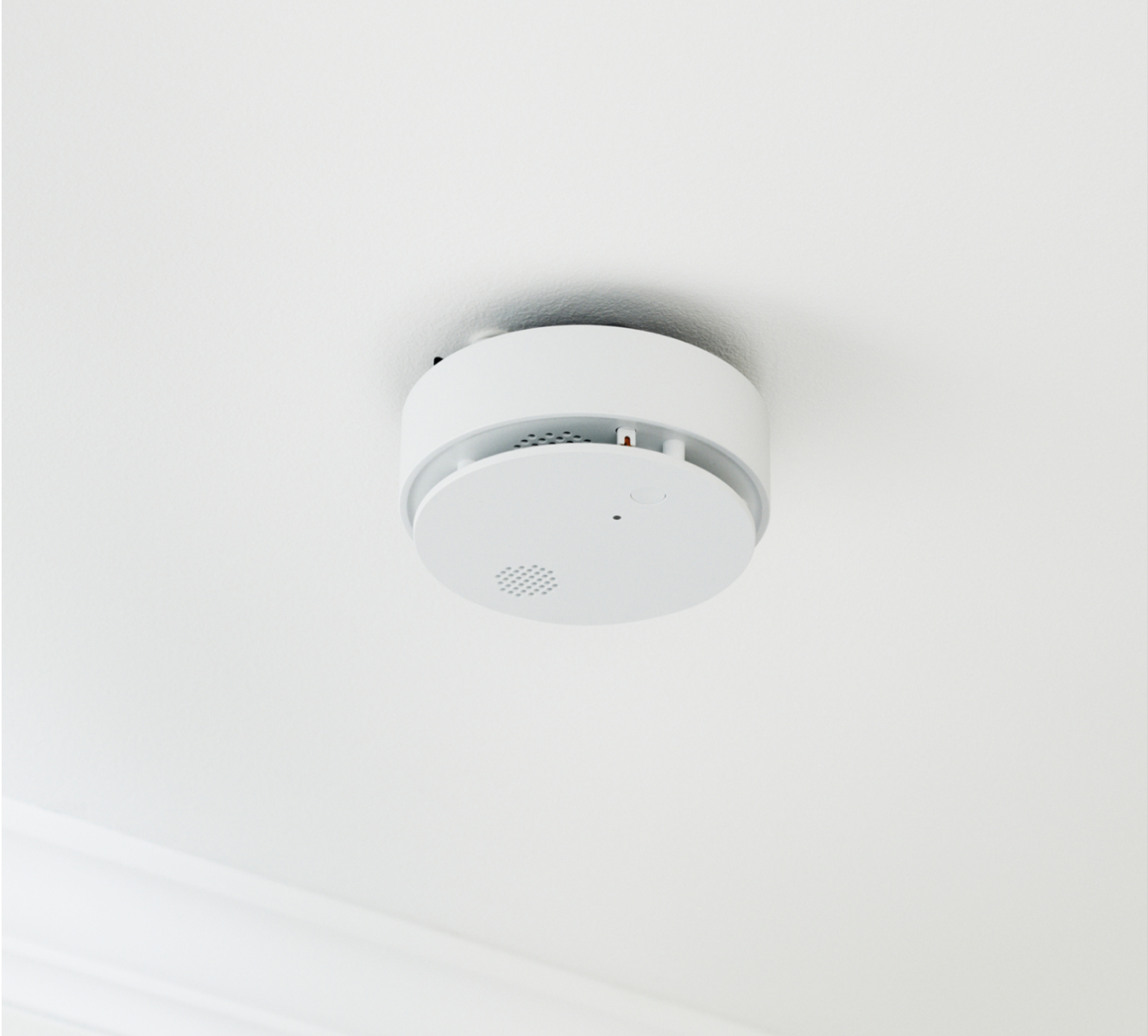 Smoke and Carbon Monoxide Detector installed on a ceiling in a home